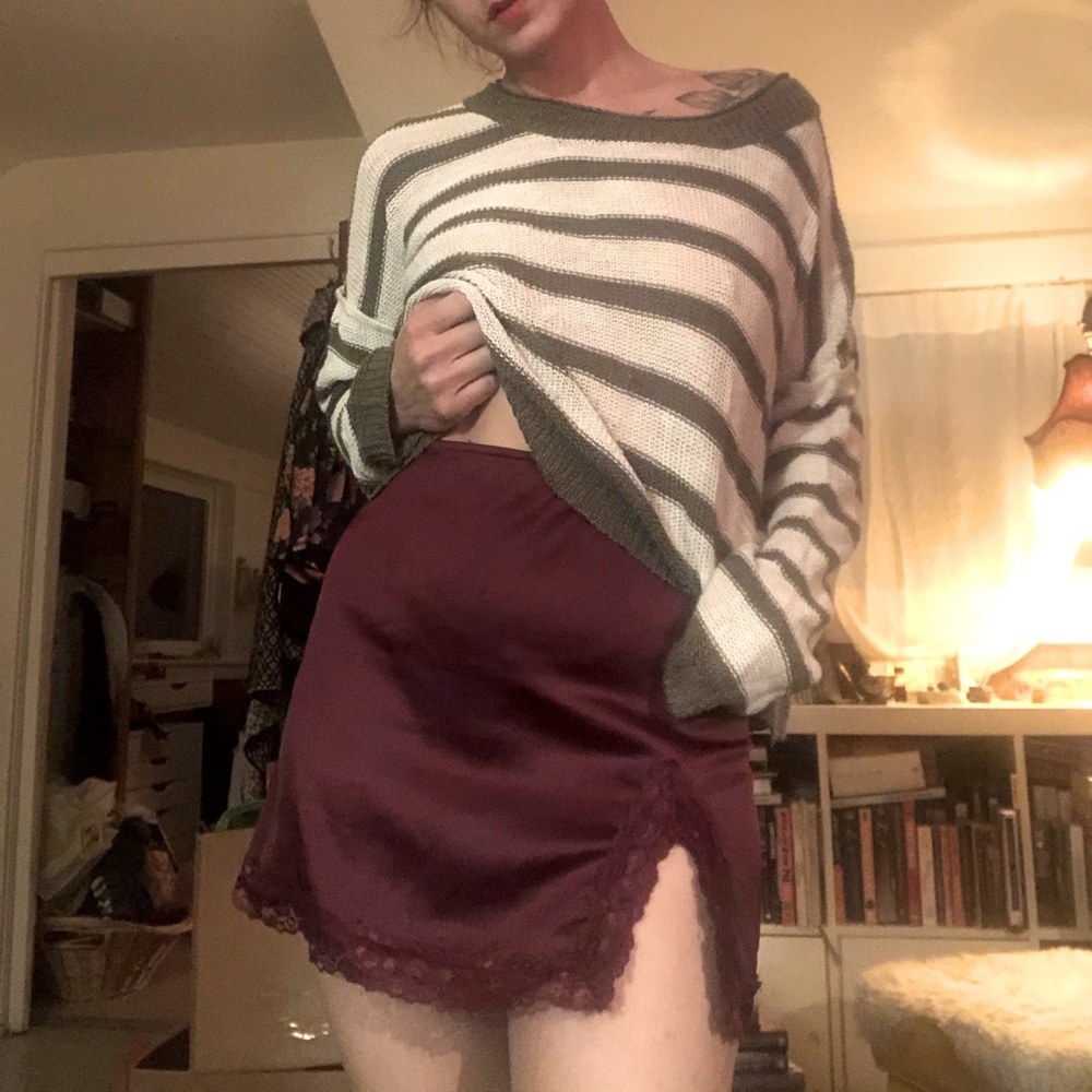 Loose green and white striped sweater. S